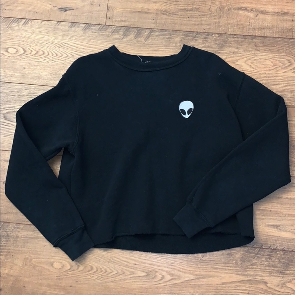Cropped black sweatshirt.